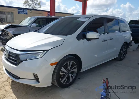 2021 Honda Odyssey Touring from USA, damaged, VIN 5FNRL6H80MB003323